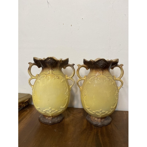 168 - A PAIR OF LOVELY VINTAGE BRITISH PAINTED PORCELAIN VASES, ornate shape with double scroll handles, d... 