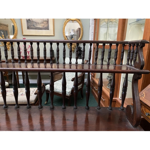 171 - AN ANTIQUE MAHOGANY WATERFALL FLOOR BOOKCASE, with five graduated shelves, turned supports to back, ... 