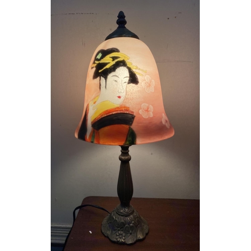 178 - A VINTAGE JAPANESE STYLE REVERSE PAINTED LAMP, depicting Geisha amongst cherry blossoms, on shaped s... 