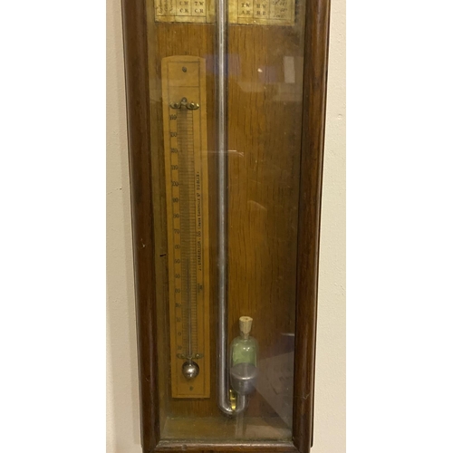 179 - A 19TH CENTURY ADMIRAL FITZROY PATTERN BAROMETER, of typical form with printed backing papers, mount... 