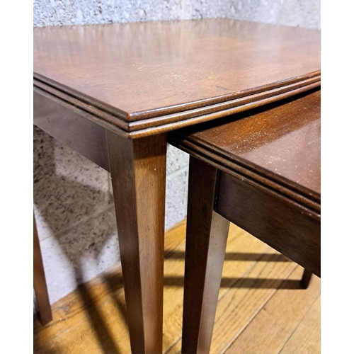 201 - A SET OF THREE MAHOGANY NEST OF TABLES, with fluted borders on straight leg, dimensions: largest: 53... 