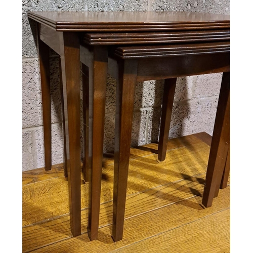 201 - A SET OF THREE MAHOGANY NEST OF TABLES, with fluted borders on straight leg, dimensions: largest: 53... 