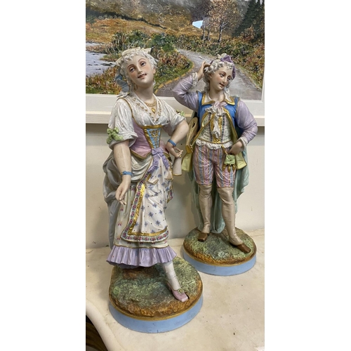 204 - AN EXCELLENT PAIR OF 19TH CENTURY CONTINENTAL PORCELAIN FIGURES, of a gentleman and lady in traditio... 