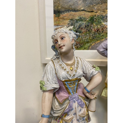 204 - AN EXCELLENT PAIR OF 19TH CENTURY CONTINENTAL PORCELAIN FIGURES, of a gentleman and lady in traditio... 