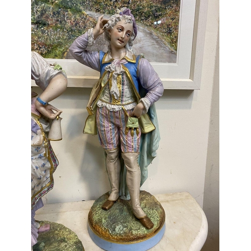 204 - AN EXCELLENT PAIR OF 19TH CENTURY CONTINENTAL PORCELAIN FIGURES, of a gentleman and lady in traditio... 