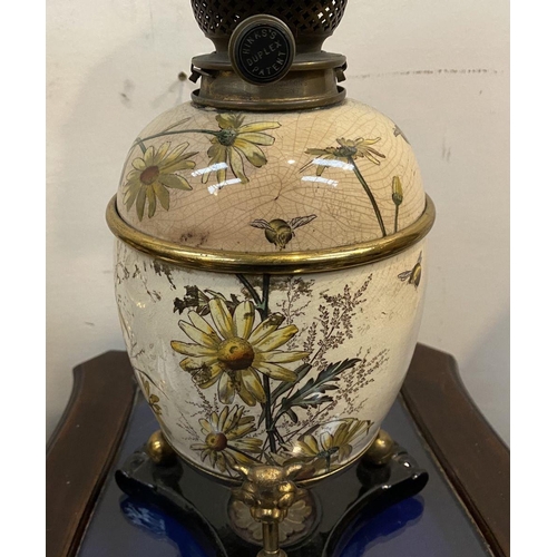 205 - A VICTORIAN ‘HINKS DUPLEX PATENT’ OIL LAMP, with double burner, painted glass depicting floral scene... 