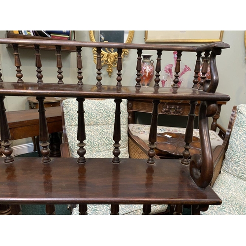 226 - AN ANTIQUE MAHOGANY WATERFALL FLOOR BOOKCASE, with five graduated shelves, turned supports to back, ... 