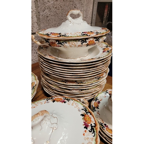 227 - A PARTIAL JOHN MADDOCKS DINNER SERVICE; ideal design. Includes: 5 oval shaped platters, 2 sauce boat... 