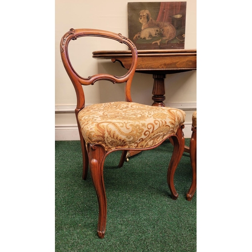 228 - A VERY GOOD PAIR OF VICTORIAN BALLOON BACK CHAIRS, each with carved acanthus leaf detail to the curv... 