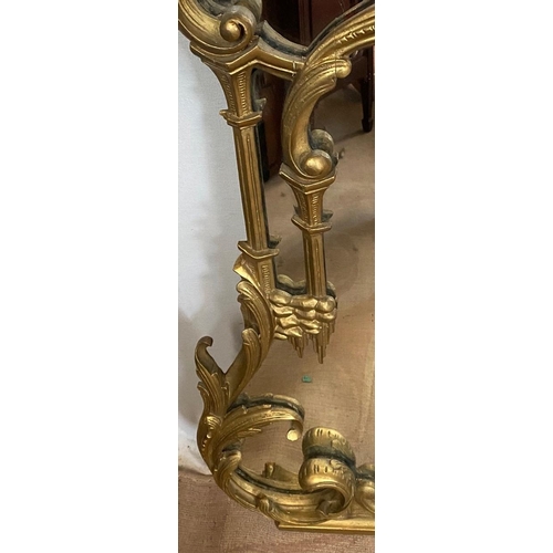 23 - A VERY FINE LARGE VICTORIAN CARVED GILTWOOD OVERMANTLE MIRROR, with scrolling foliage detail all ove... 