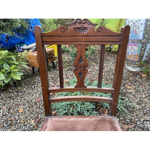 233 - A LATE VICTORIAN CARVED HALL CHAIR, with carved back splat, upholstered seat, supported by turned le... 