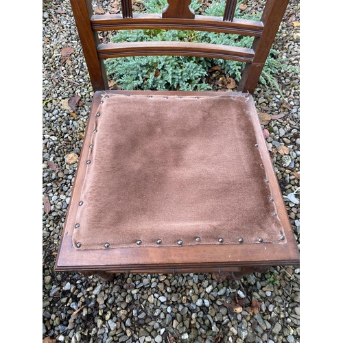 233 - A LATE VICTORIAN CARVED HALL CHAIR, with carved back splat, upholstered seat, supported by turned le... 