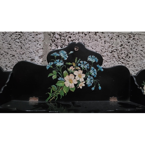 236 - A FRENCH EBONISED COLLAPSIBLE LAQUERED WALL SHELF, decorated all over with hand painted floral bouqu... 