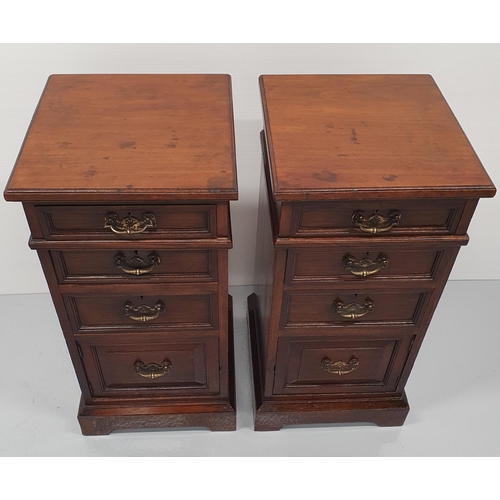 24 - A FINE PAIR OF 19TH CENTURY STRAIGHT GRAIN WALNUT BEDSIDE CABINETS / LAMP CABINETS, each with a set ... 