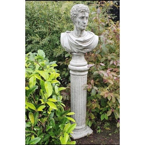 242 - A GARDEN STATUE / ORNAMENT IN THE FORM OF A BUST OF MARC ANTHONY, raised upon a plinth base. 5ft tal... 