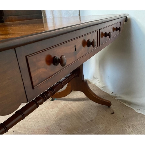 29 - A VERY GOOD QUALITY WILLIAM IV MAHOGANY LIBRARY / SOFA TABLE, with rounded corners to the surface, a... 