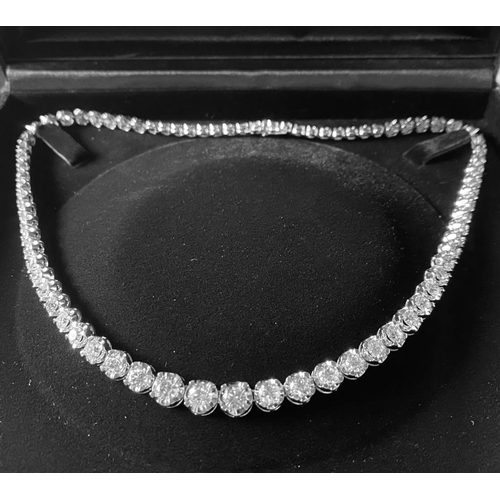 36 - A WONDERFUL 18CT WHITE GRADUATED DIAMOND NECKLACE, claw set with 15.62cts of graduated brilliant cut... 