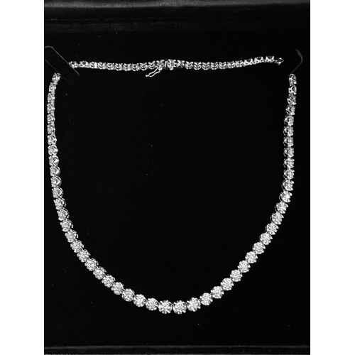 36 - A WONDERFUL 18CT WHITE GRADUATED DIAMOND NECKLACE, claw set with 15.62cts of graduated brilliant cut... 