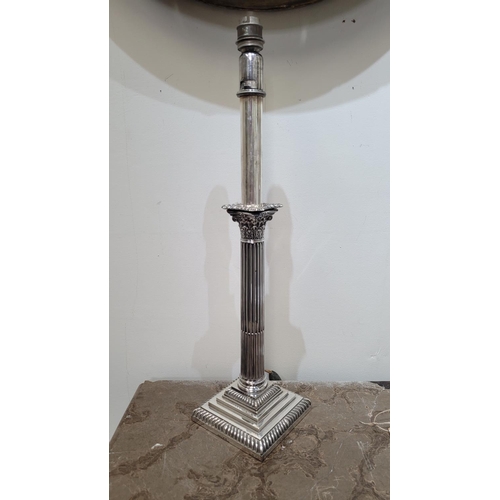 37 - A VERY FINE PAIR OF SILVER PLATED CORINTHIAN STYLE COLUMN TABLE LAMPS, each with adjustable height, ... 