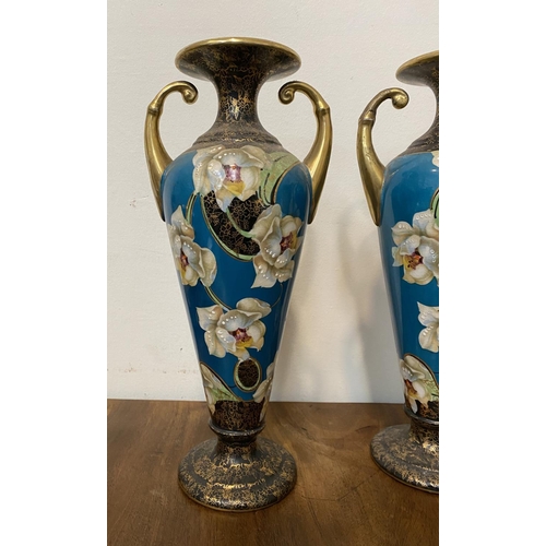 41 - A PAIR OF FINE ANTIQUE PHOENIX WARE VASES, with scroll handles, fluted rim, tapered body on circular... 