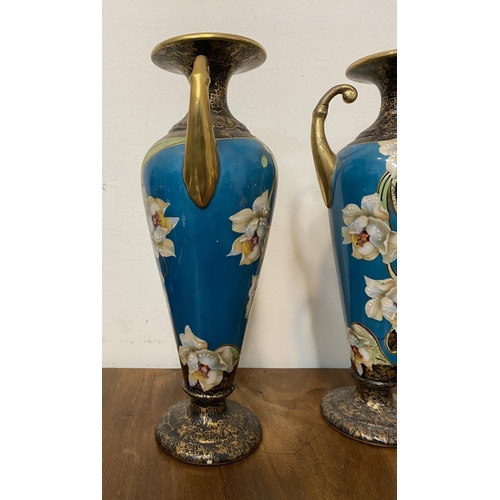 41 - A PAIR OF FINE ANTIQUE PHOENIX WARE VASES, with scroll handles, fluted rim, tapered body on circular... 