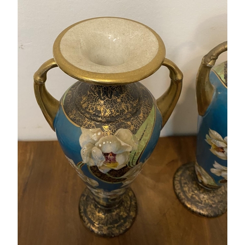 41 - A PAIR OF FINE ANTIQUE PHOENIX WARE VASES, with scroll handles, fluted rim, tapered body on circular... 