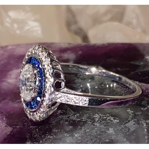 5 - AN ART DECO 18CT WHITE GOLD SAPPHIRE & DIAMOND TARGET RING, diamonds surrounding the French cut sapp... 