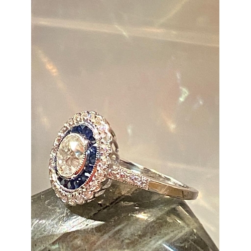 5 - AN ART DECO 18CT WHITE GOLD SAPPHIRE & DIAMOND TARGET RING, diamonds surrounding the French cut sapp... 