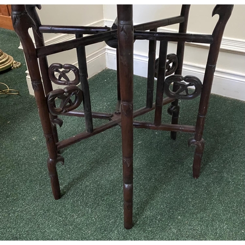 50 - AN ANTIQUE ANGLO/INDIAN FOLDING SIDE TABLE, brass embossed shaped circular top, with character mark ... 