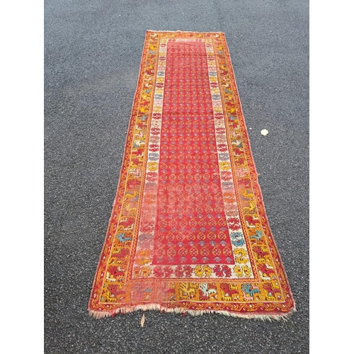 52 - AN ANTQIUE CAUCASIAN FLOOR RUNNER; with beautiful bright & cheerful colour palette, decorated all ov... 