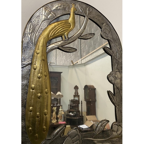 53 - A LOVELY ART NOUVEAU ARCHED WALL MIRROR, with decorative brass frame depicting peacock on branch wit... 