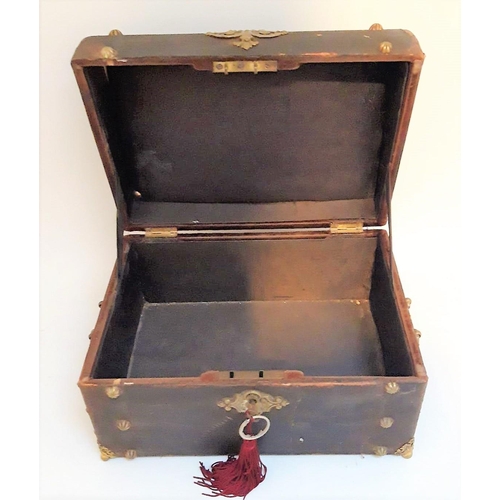 59 - AN ANTIQUE DOMED BRASS MOUNTED CASKET BOX, with original key present, box perhaps used in the past t... 