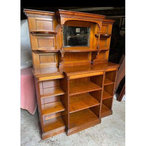 64 - A GOOD QUALITY MAHOGANY OPEN BREAK-FRONT FLOOR BOOKCASE, with a raised back gallery to the top, with... 