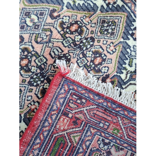 67 - A VERY GOOD QUALITY PERSIAN HAMADAN FLOOR RUG, with central lozenge medallion, surrounded by floral ... 