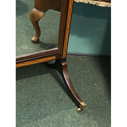 71 - A MAHOGANY INALID CHEVAL MIRROR, arched rectangular form, with intricate satinwood inlay to supports... 