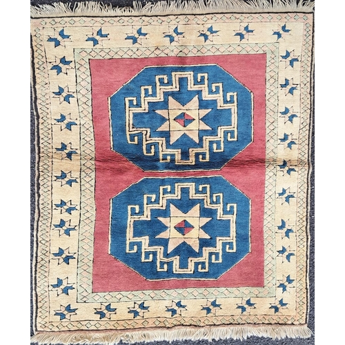 75 - A TRADITIONAL TURKISH ‘KARS’ FLOOR RUG, with double medallion design to the centre, having main grou... 