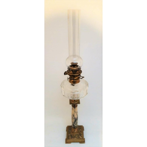 76 - A LARGE VICTORIAN OIL LAMP, with clear glass chimney & reservoir, the column base with stone body, t... 