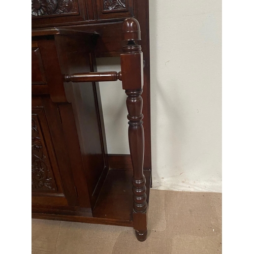 81 - A GOOD QUALITY TALL MIRROR BACKED HALL WAY STAND, with four coat hooks to the raised back gallery, 2... 