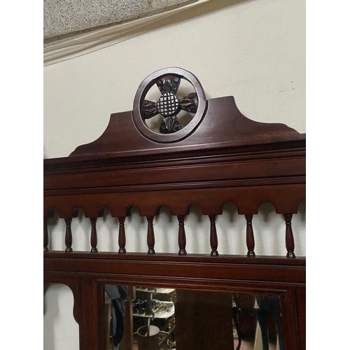 81 - A GOOD QUALITY TALL MIRROR BACKED HALL WAY STAND, with four coat hooks to the raised back gallery, 2... 