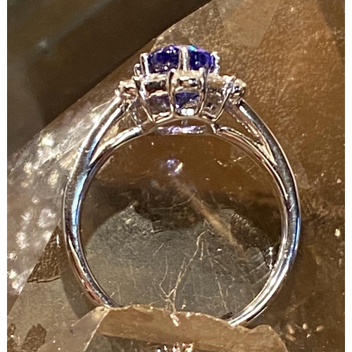 83 - A SUPERB 18CT WHITE GOLD TANZANITE & DIAMOND CLUSTER RING, tanzanite weight: 2.00cts surrounded by s... 