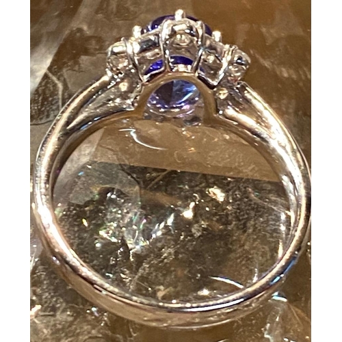 83 - A SUPERB 18CT WHITE GOLD TANZANITE & DIAMOND CLUSTER RING, tanzanite weight: 2.00cts surrounded by s... 