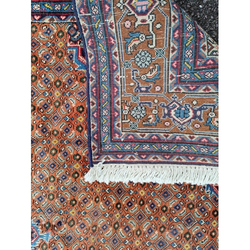 9 - A LARGE & GOOD QUALITY BRIGHTLY COLOURED HAND-KNOTTED PERSIAN TABRIZ FLOOR RUG, to the centre is a l... 