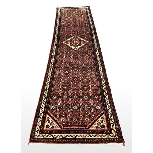 93 - A PERSIAN HUSSENARD RUNNER RUG, material: hand spun wool with natural organic dyes; design: this rug... 