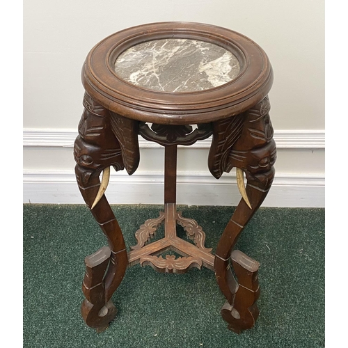 94 - A FRENCH CARVED MAHOGANY MARBLE TOPPED SIDE TABLE/PLANT STAND, intricately carved with elephant desi... 