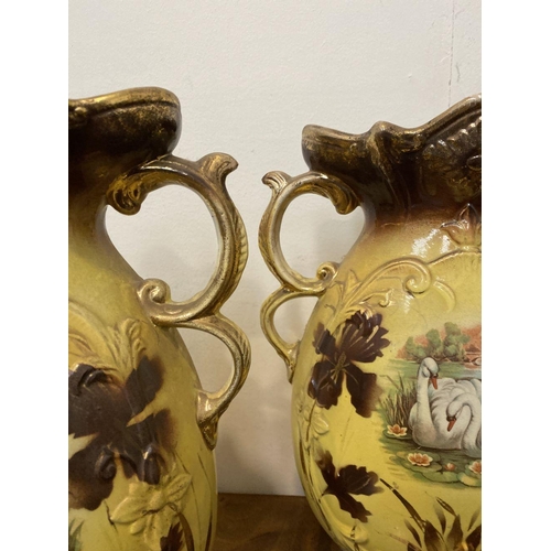 110 - A PAIR OF LOVELY VINTAGE PAINTED PORCELAIN VASES, ornate shape with double scroll handles, decorated... 