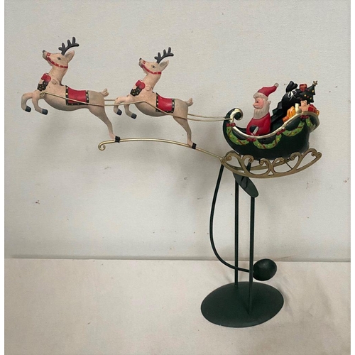 125 - A CHARMING CHRISTMAS PENDULUM, with Santa on sleigh with reindeers.