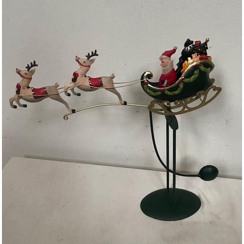 125 - A CHARMING CHRISTMAS PENDULUM, with Santa on sleigh with reindeers.