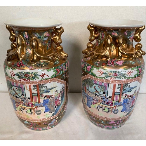 13 - A PAIR OF CHINESE FAMILLE ROSE VASES, with decorative gilt relief design to neck, above painted figu... 