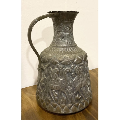 174 - AN EXCELLENT ANTIQUE MIDDLE EASTERN COPPER WATER PITCHER, with curved handle attached to shaped rim,... 