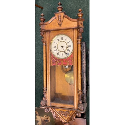 179 - AN EXCELLENT CARVED AMERICAN WALL CLOCK, with roman numerals to white dial, in hardwood case, carved... 